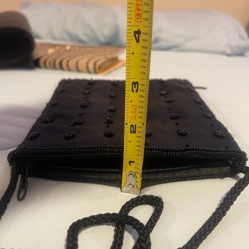 Satin beaded crossbody black purse.Zip closure. 6”x6”x1”  and 21” Handle - Picture 8 of 9
